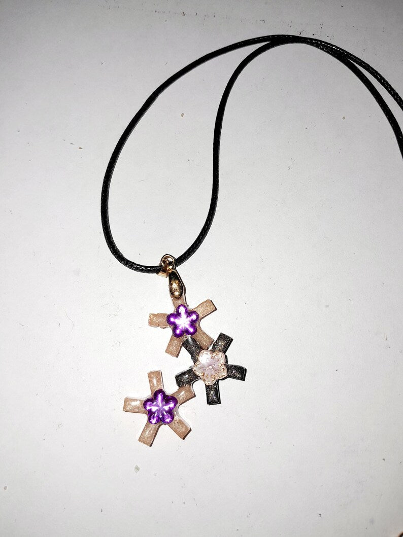 Pendentif astérisque