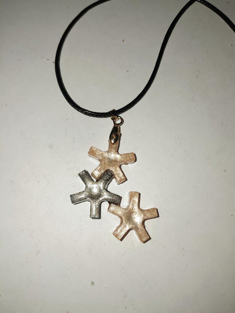 Pendentif astérisque